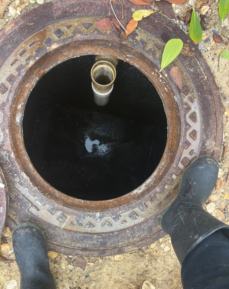 The same commercial grease interceptor after pump-out and cleaning
